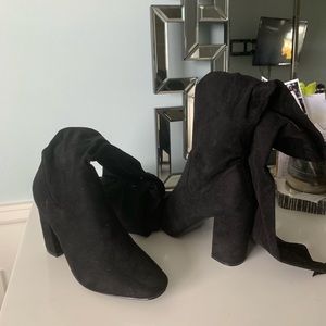 Thigh high black boot